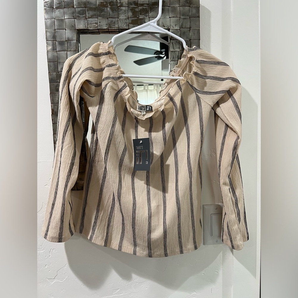 Off the shoulder long sleeve blouse.
